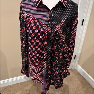Beautiful floral, long sleeve, Free People blouse. Size Medium